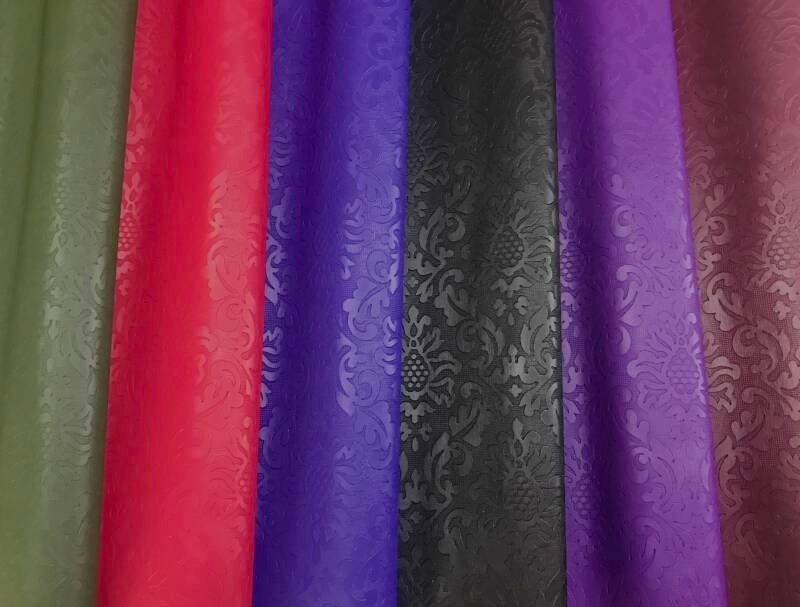 Damast in groen, rood, kobalt, zwart, paars en bordeauxrood