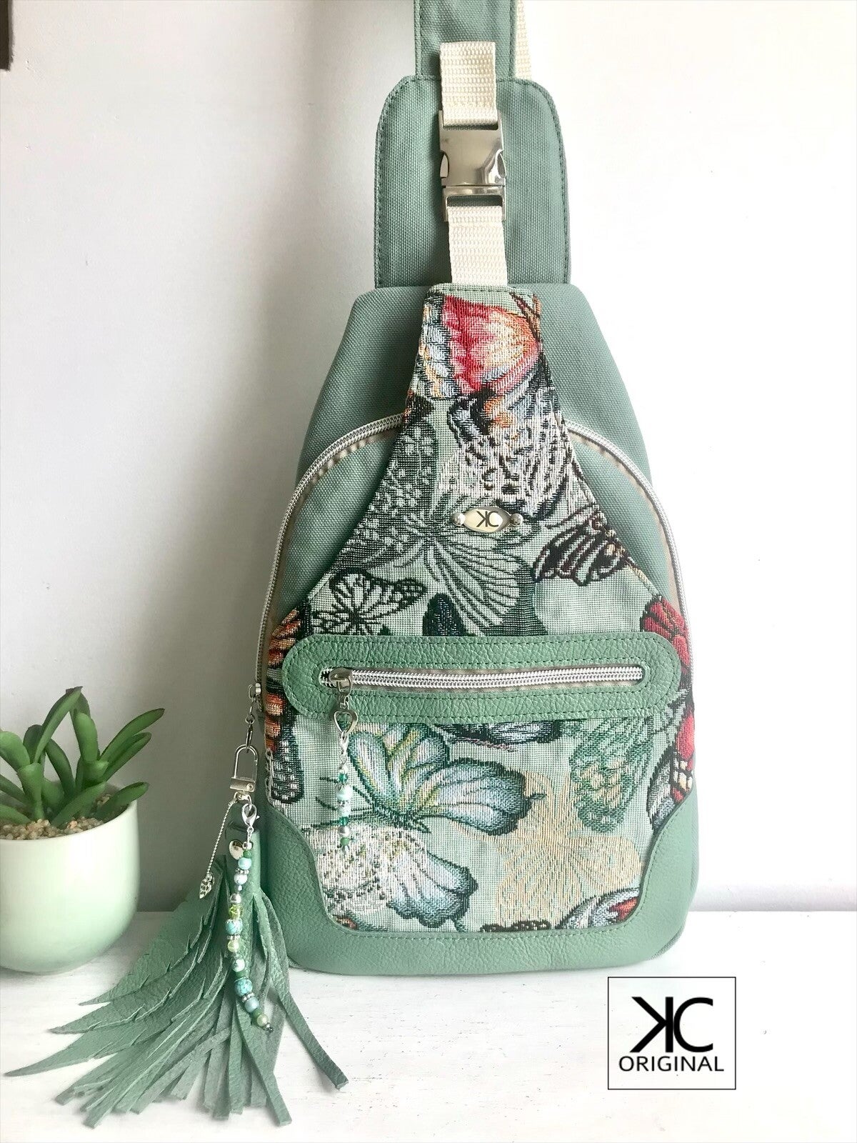 Sling tas Wayfarer gobelin stof vlinders groen