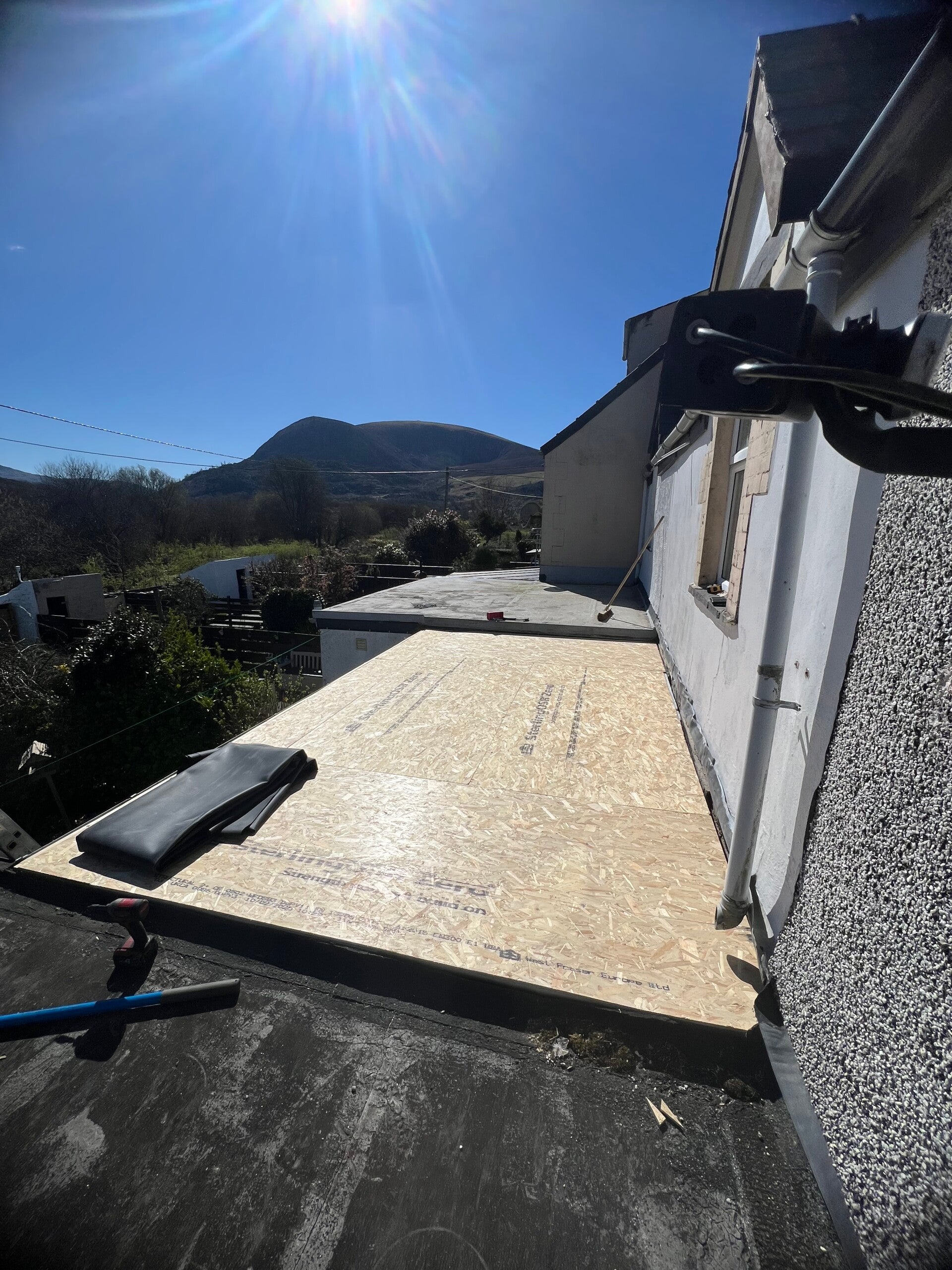 New OSB decking prepared for a flat roof installation