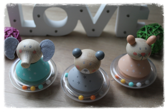 Jouet culbuto en bois animaux