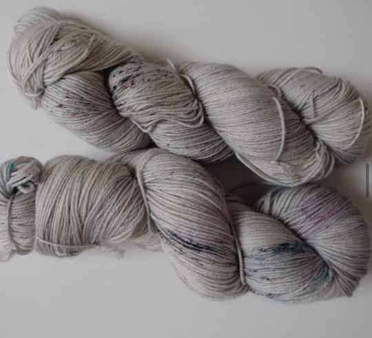Grey with speckles