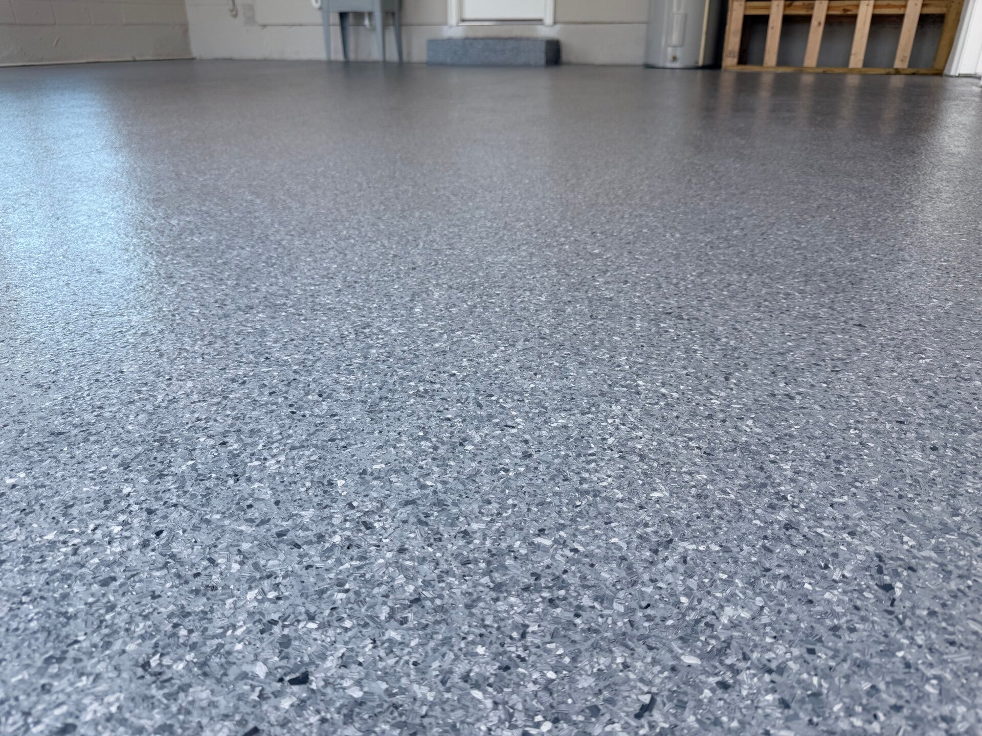 Epoxy garage floor coating with decorative flakes