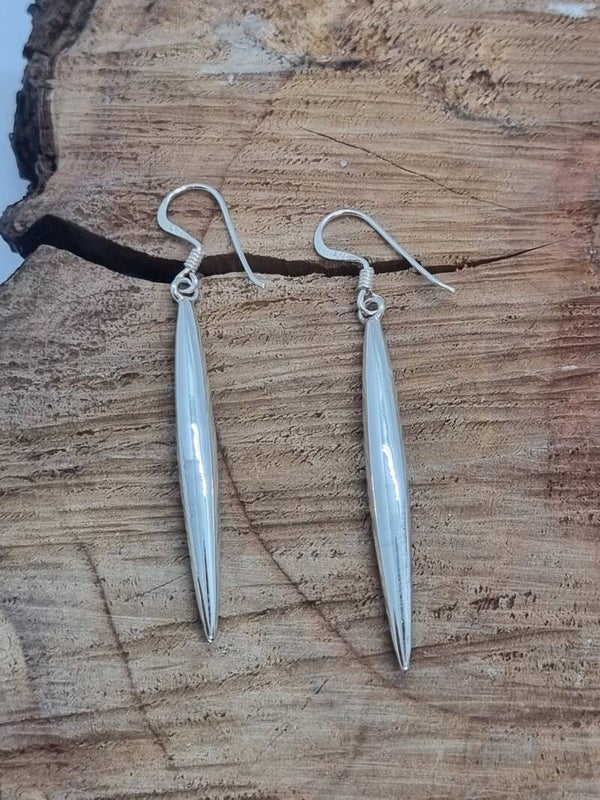 Zilveren oorbellen pegels