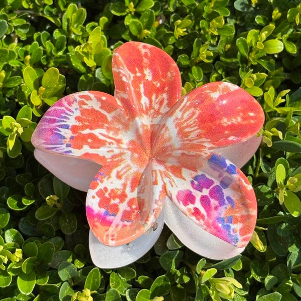 Speld exotische bloem, oranje-rood