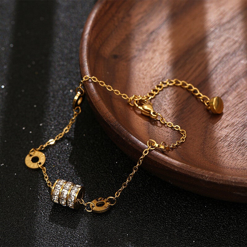 Armband goud met steentjes