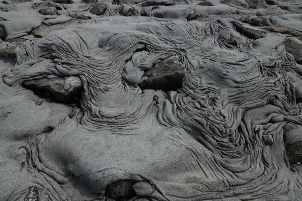 Von Wasser geformter Sand