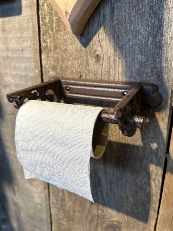 Toiletrol houder