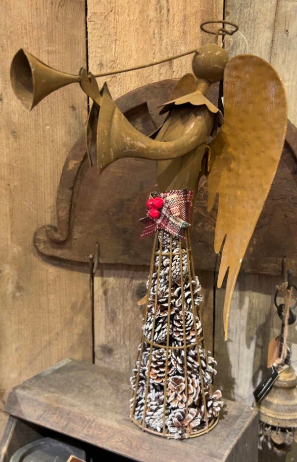 Engel blazend op trompet .