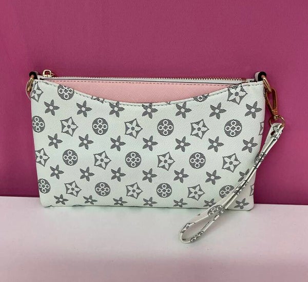Cartera de mano blanca con estampado monograma