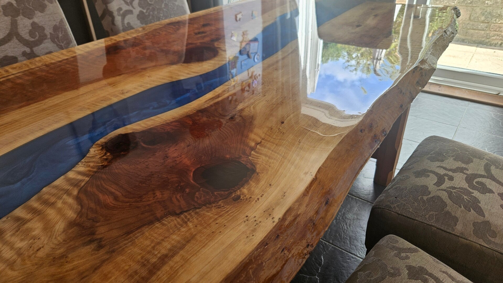 Live edge dining table with Epoxy River