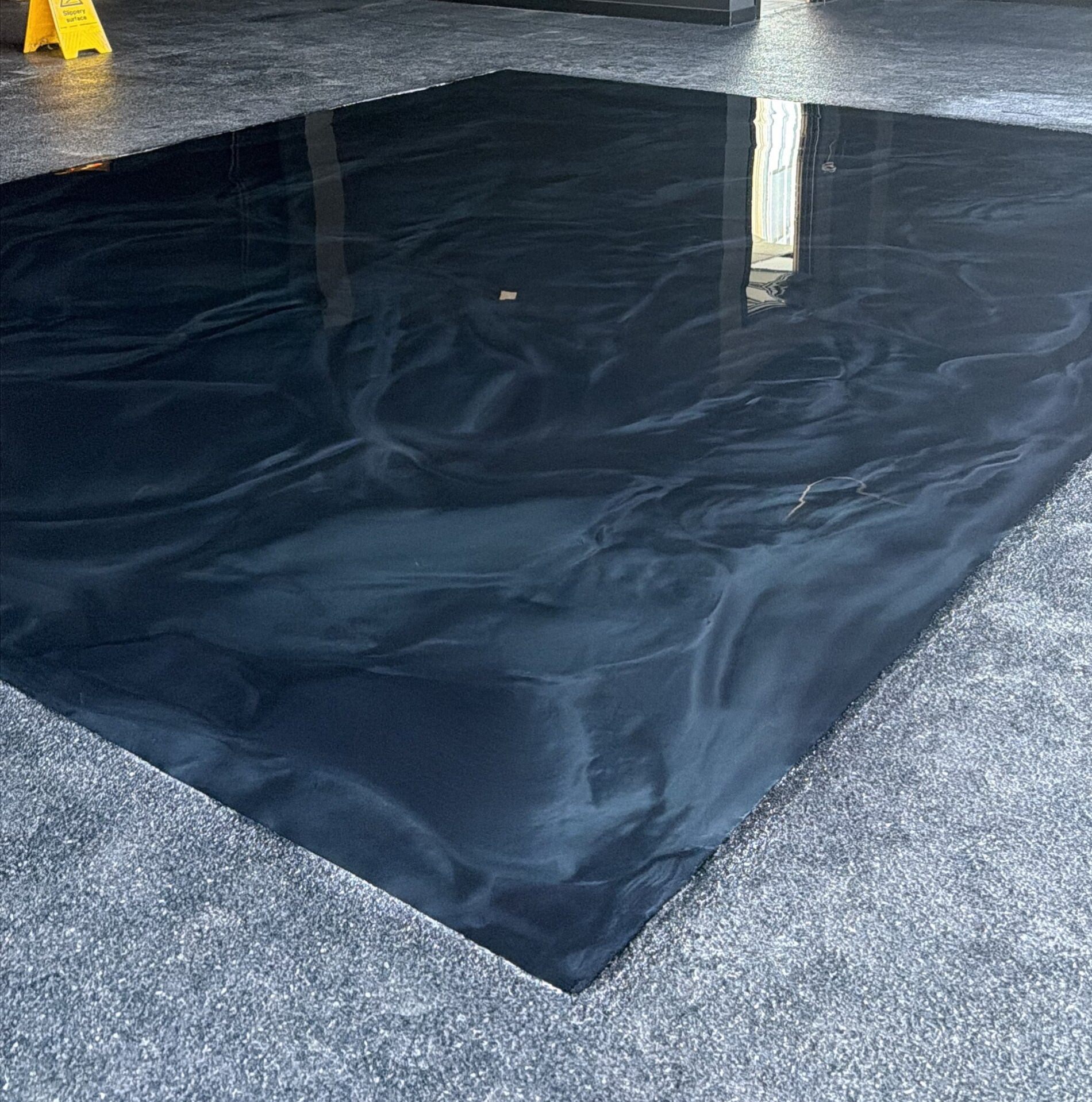 Flake-and-metallic-epoxy-resin-floor