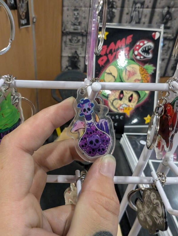 Porte clés poison