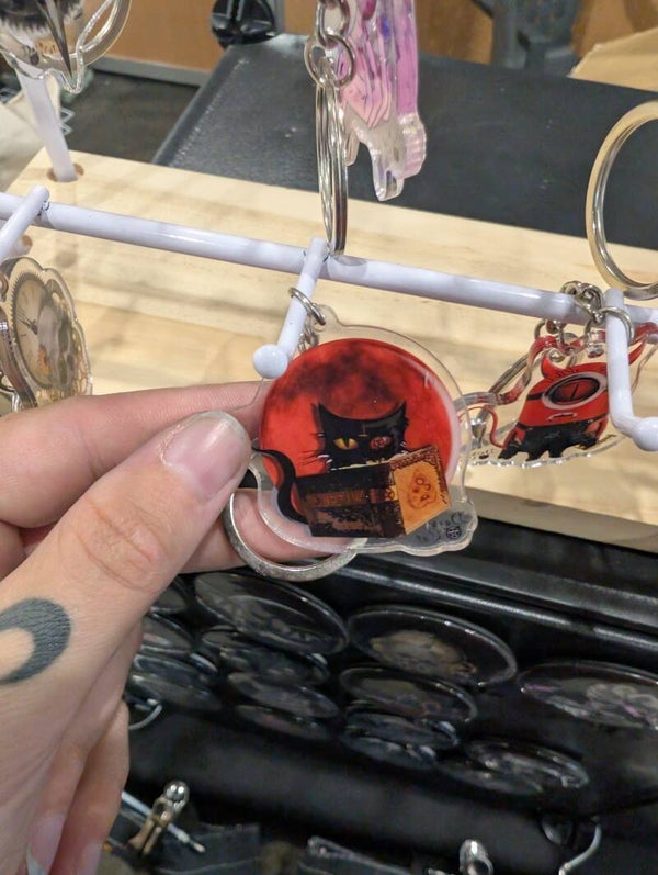 Porte clés chat maléfique