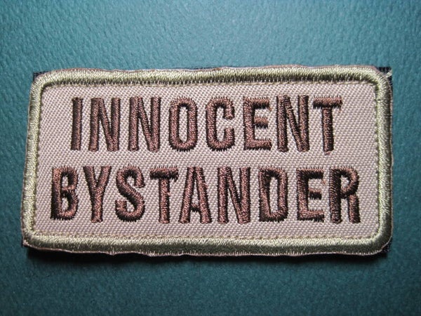 INNOCENT BYSTANDER MORALE PATCH EMBROIDERY HOOK BACK