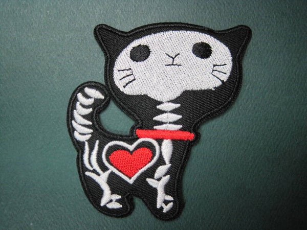 XRAY KITTY WITH A HEART PATCH, GREAT DETAIL, IRON ON