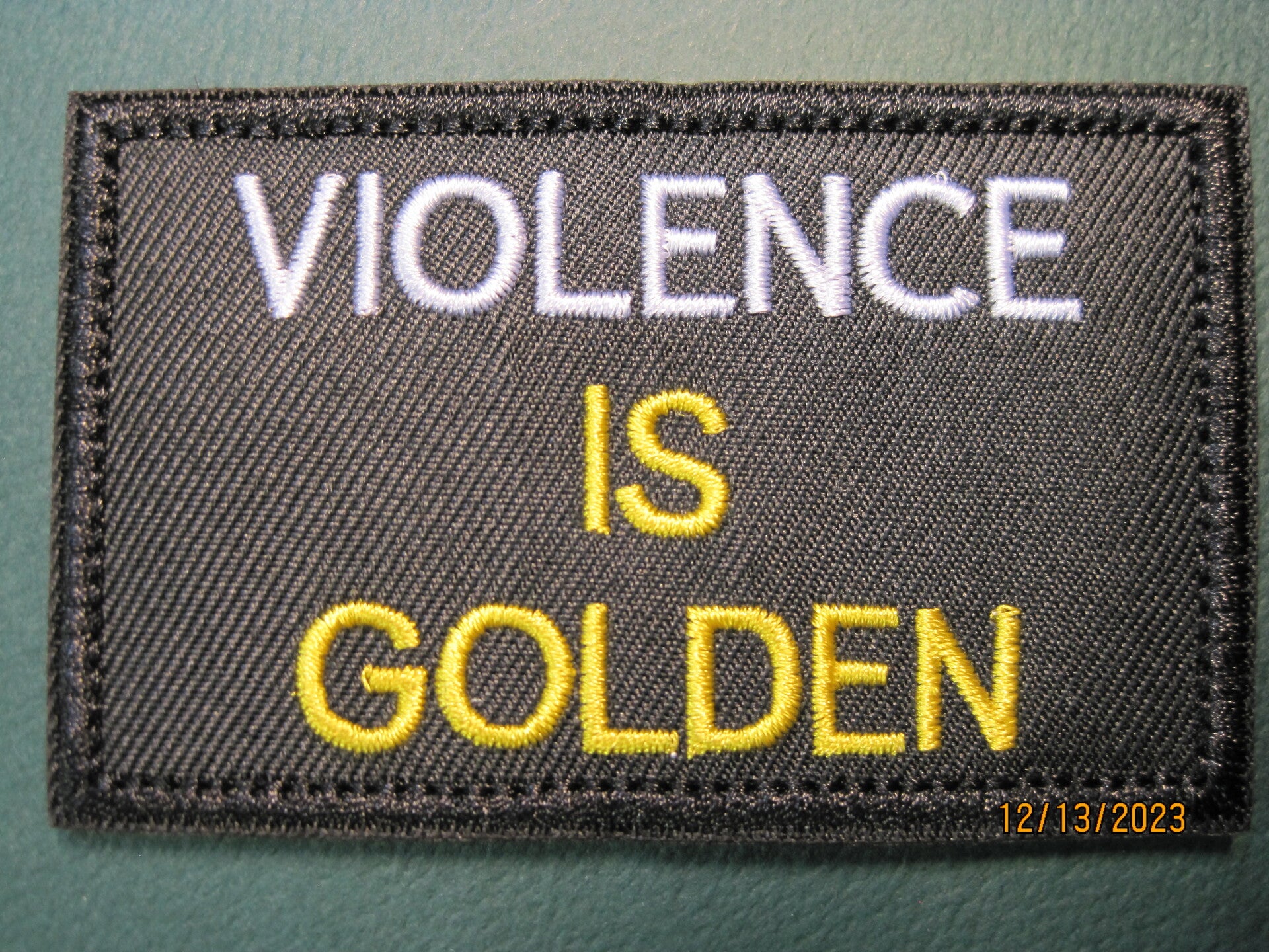 VIOLENCE IS GOLDEN MORALE PATCH HOOK BACK