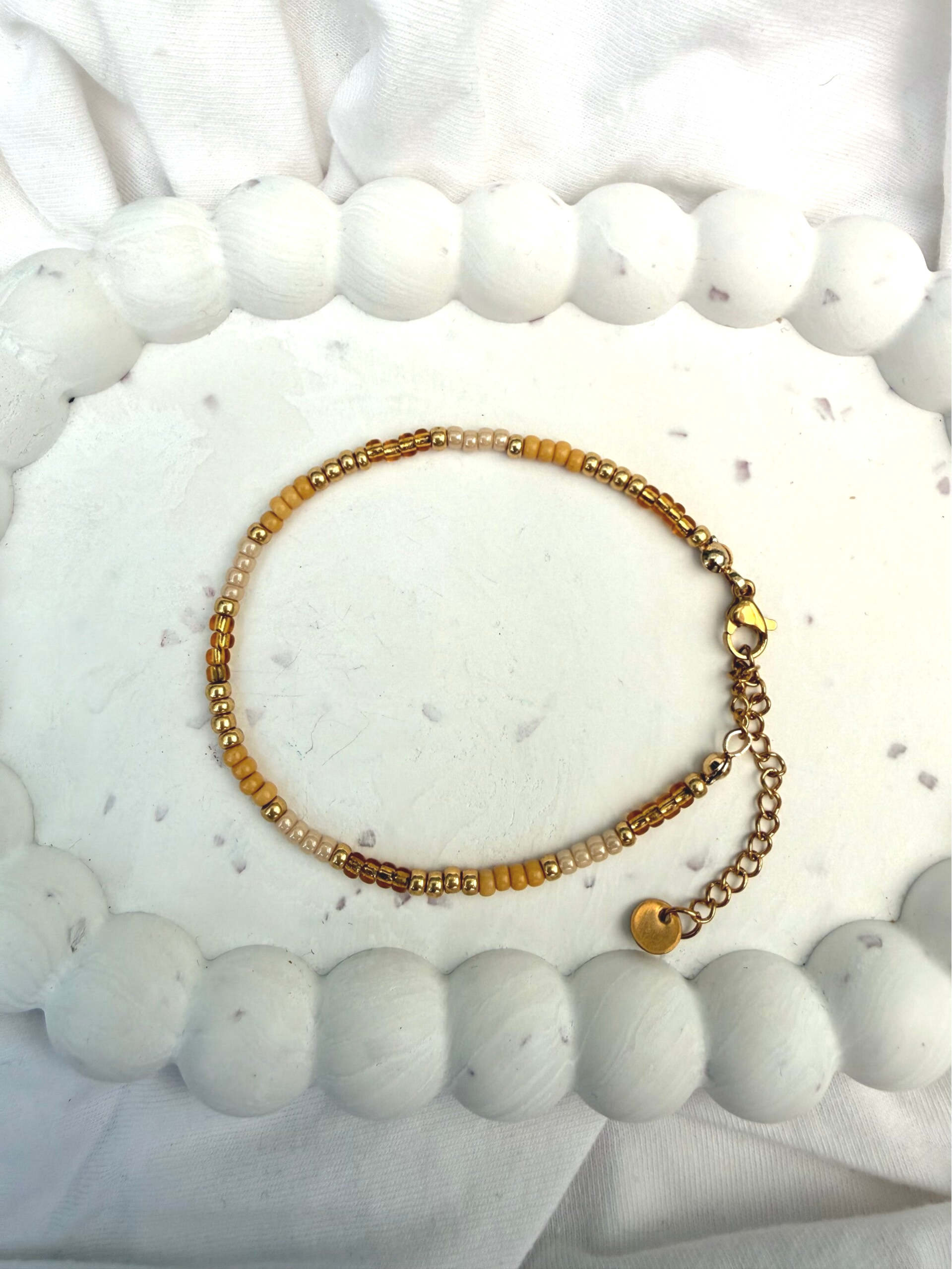 armbanden - zomercollectie/bruin tinten goud