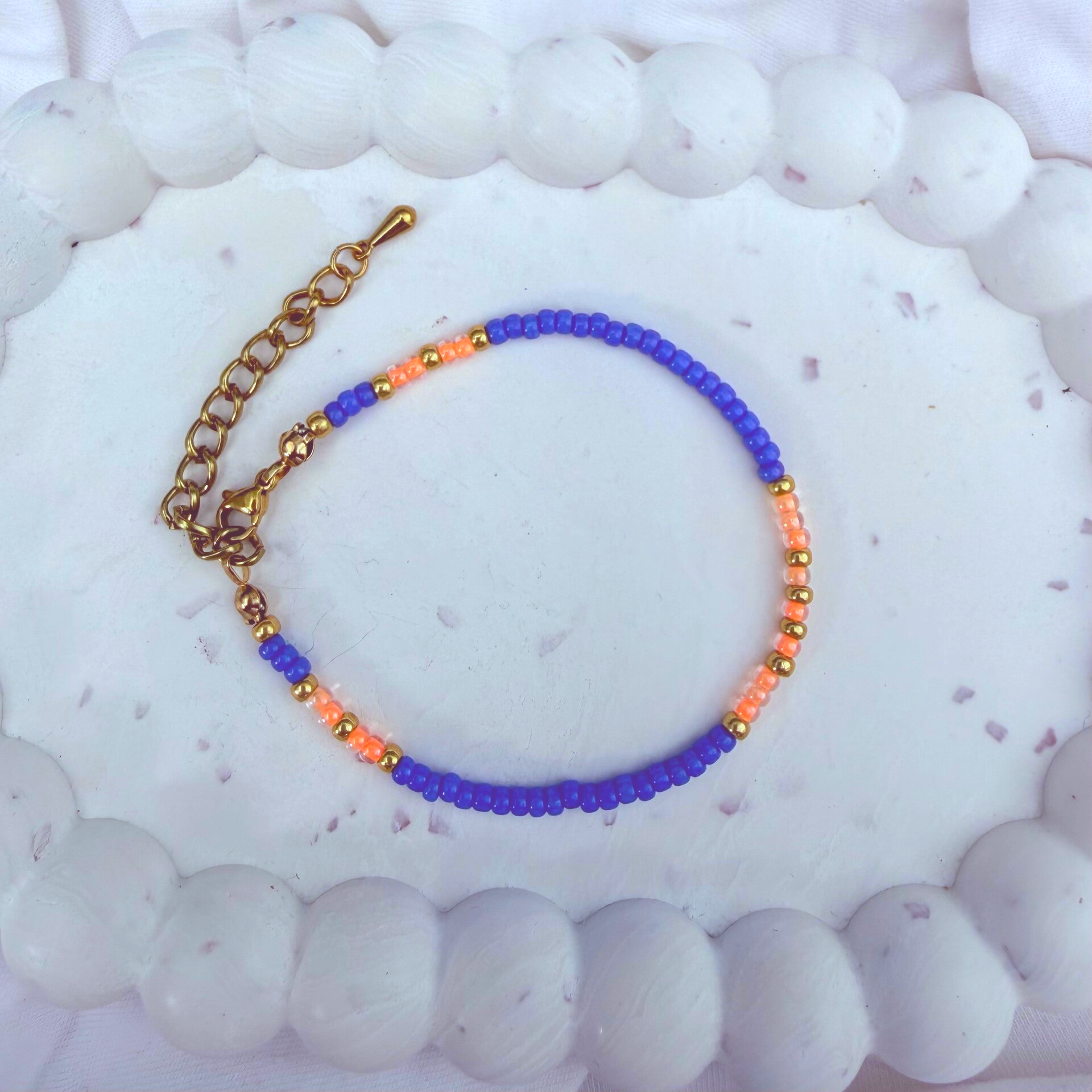 armbanden - zomercollectie/paars zalm goud