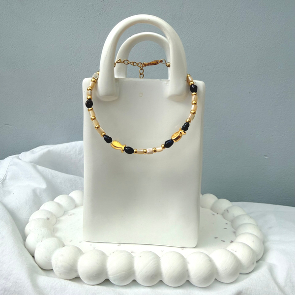 armbanden - timeless -  goud met kleine visjes
