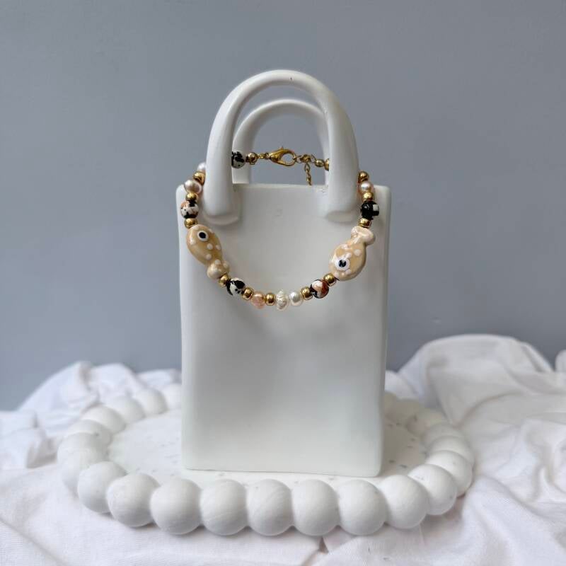 armbanden - visjes collectie 16 cm Upper beige dot visje zoetwaterparels