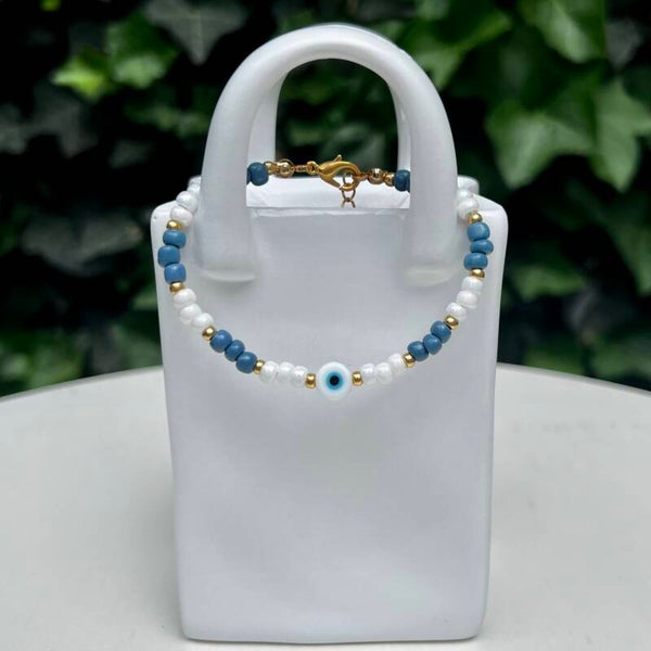 armbanden - zomercollectie/oogje - goud