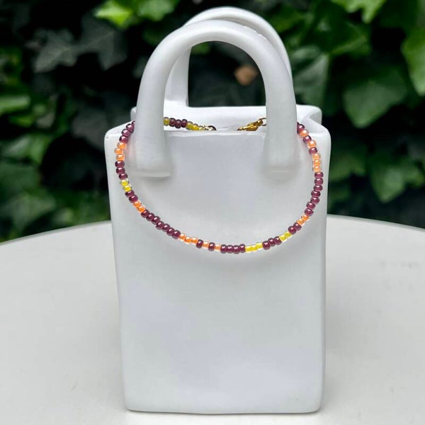 armbanden - zomercollectie/paars-geel