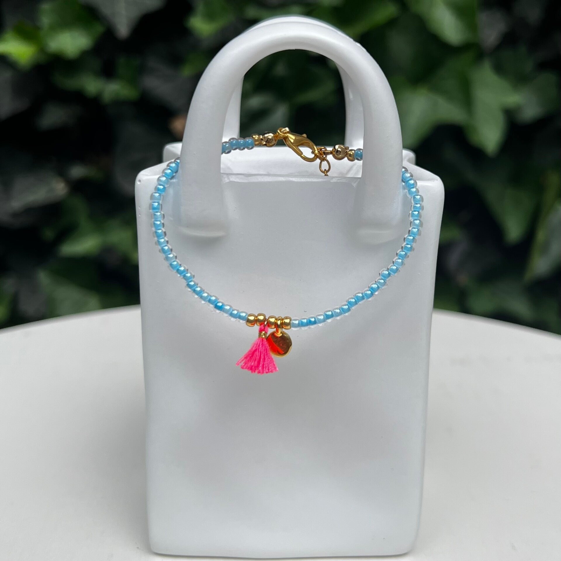 armbanden - zomercollectie/blauw met bedeltje