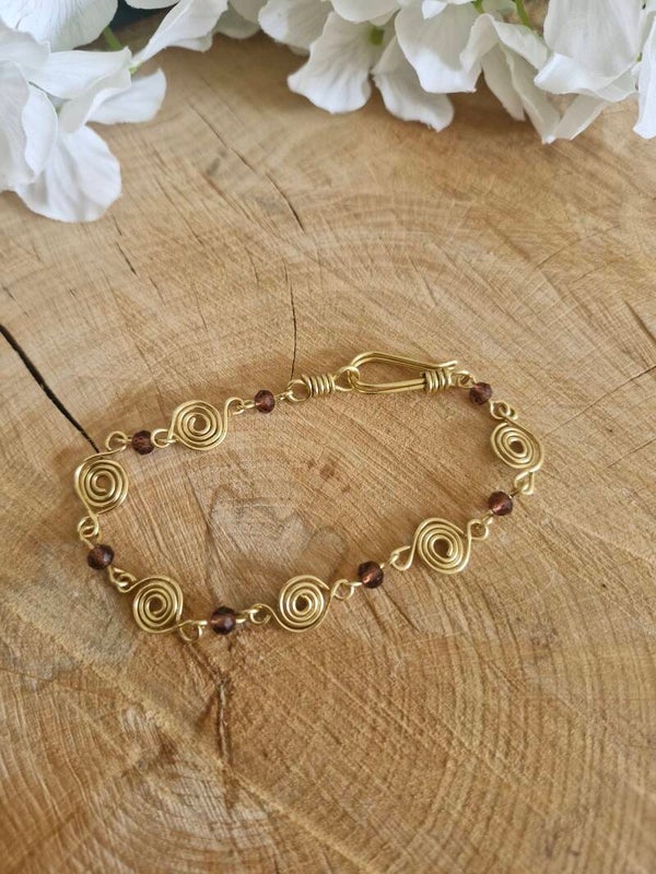 Armband Swirl Klein Goudkleurig