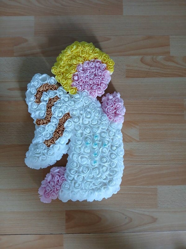 ange en fleurs artificielles