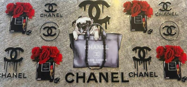 Chanel with dog in purse