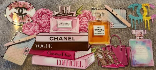 Chanel with books and perfume