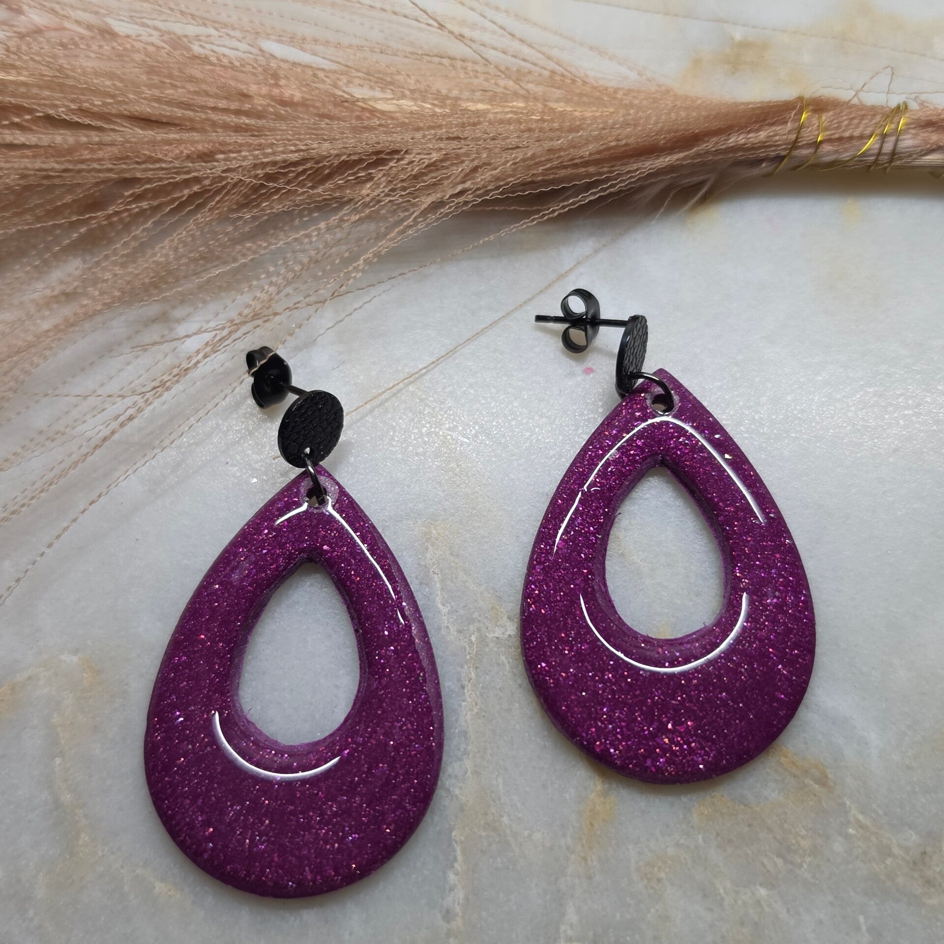 Glitter oorbellen paars