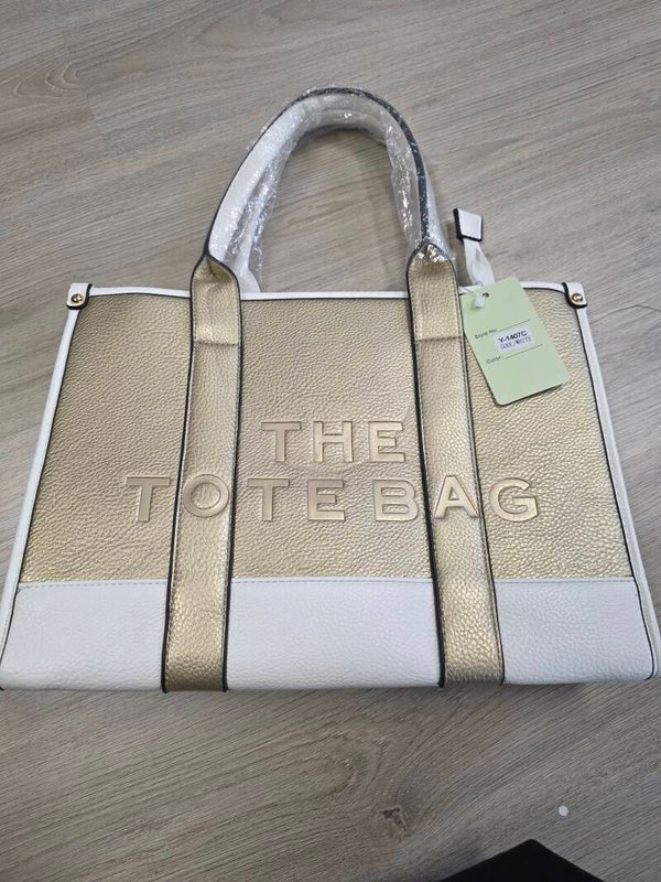 La tas goud wit