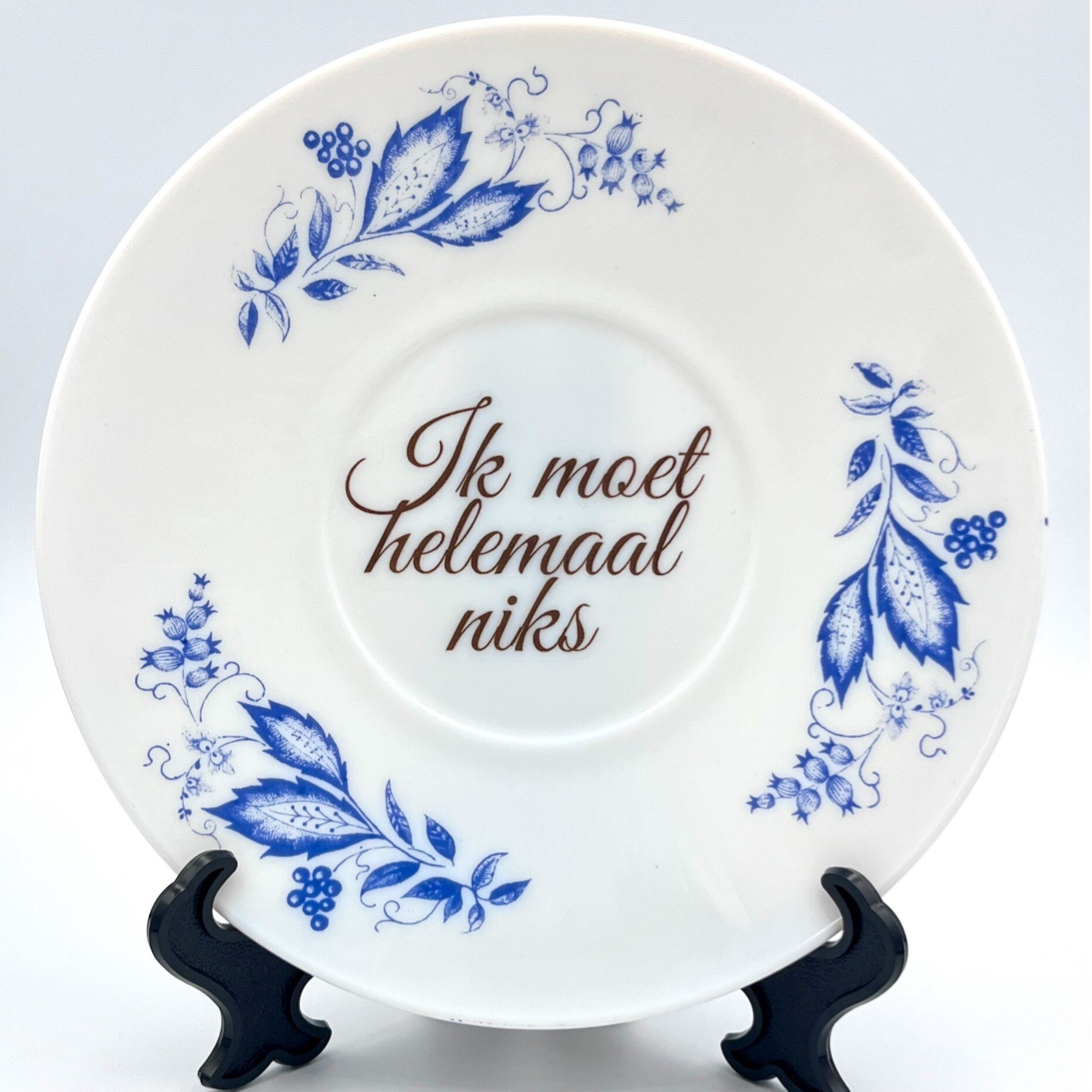vitnage wandbord met de tekst: ik moet helemaal niks