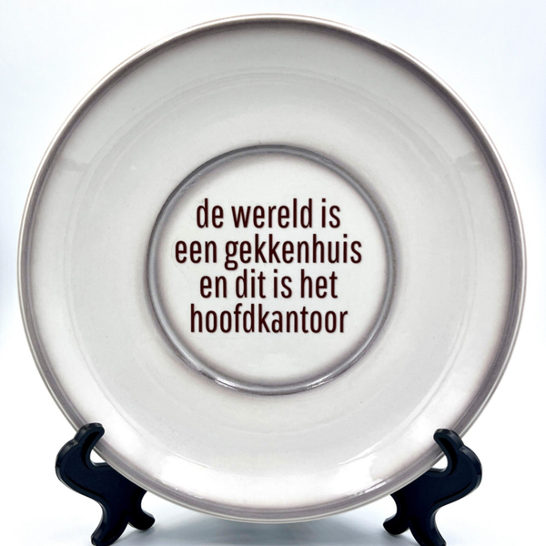 Wandbord de wereld is een gekkenhuis