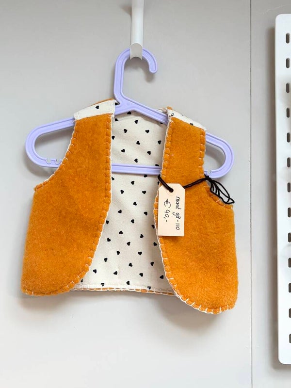 Reversible bodywarmer maat 98-110 oranje hartjes