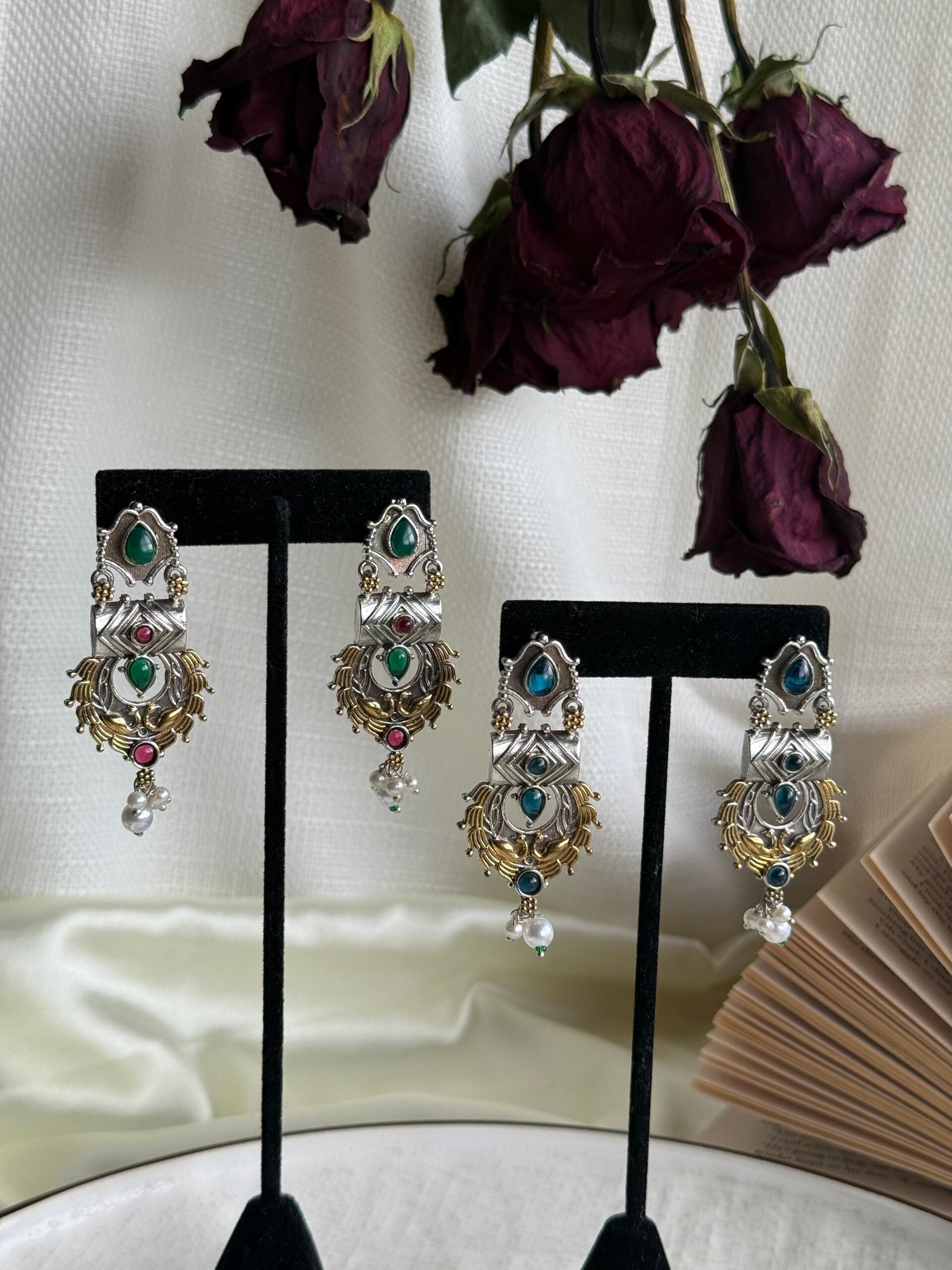 Dual tone peacock design earrings