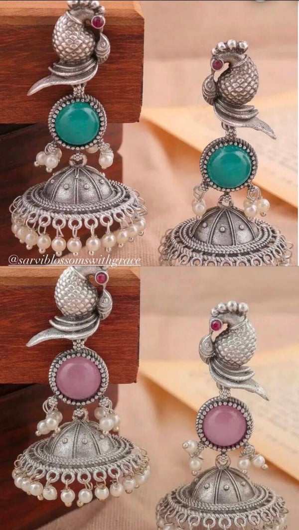 Traditional bird inspired design earrings
