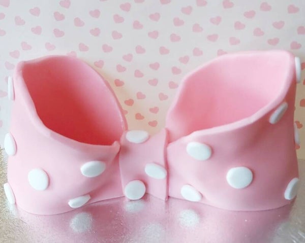 Strik groot roze met witte stippen