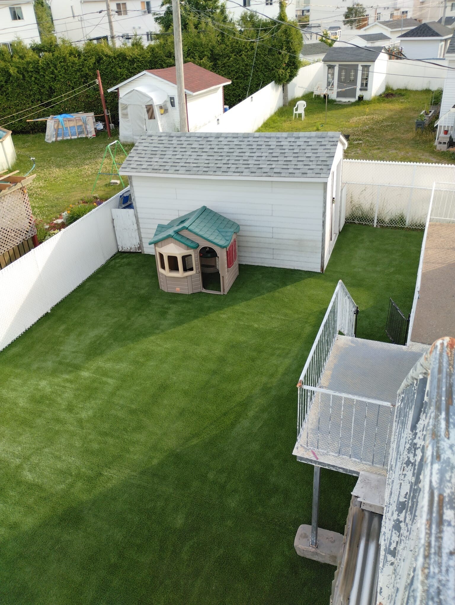 Artificial grass playground installation at a daycare in Mascouche, Quebec by Capo Surface
