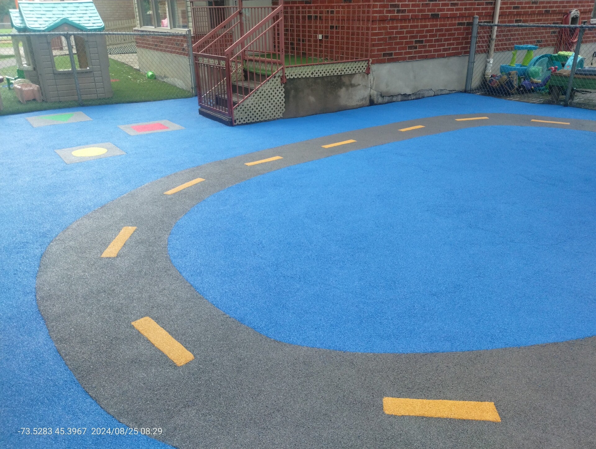 Durable rubber safety surface at daycare playground in Candiac CPE