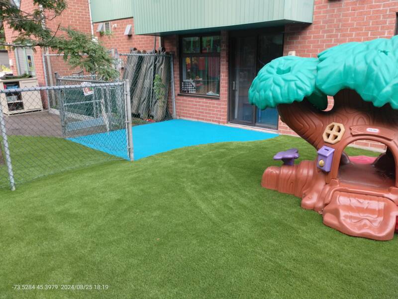 Candiac Quebec daycare playground with poured rubber safety surface – Capo Surface
