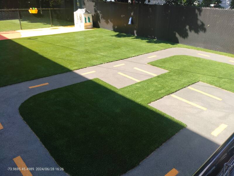 Daycare playground in Oka, Quebec with rubber safety surface