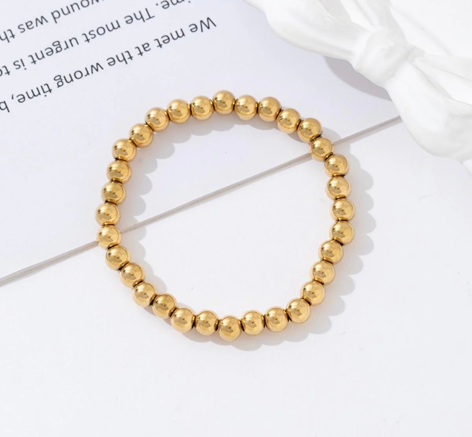 Gouden kleine beads armband