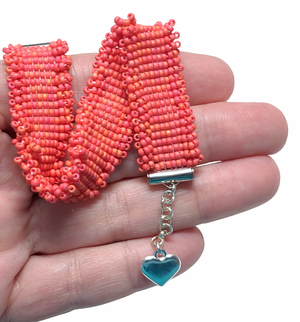 Ruffle armband roze/rood