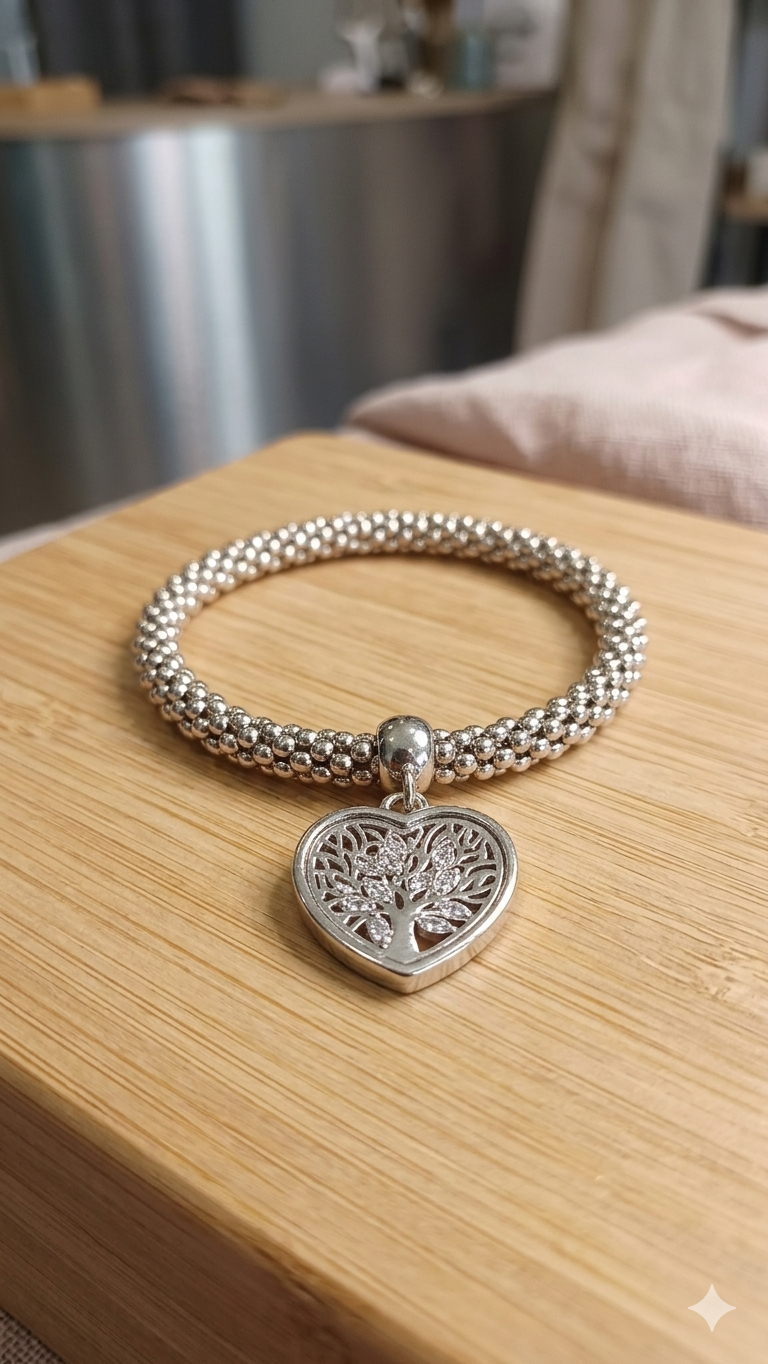 Elastisches Kugelarmband „Lebensenergie“ – Silberoptik mit funkelndem Lebensbaum-Herz  (Für Frauen)