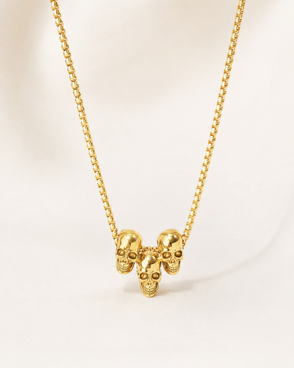 Ketting met 3 skull hanger goud