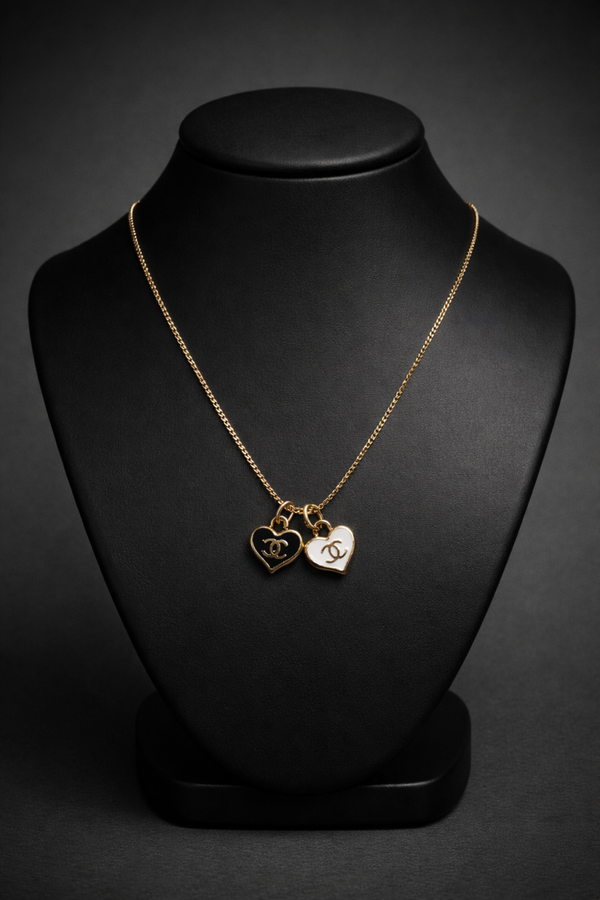 Chanel 1:1 ketting goud 2 hartjes zwart/wit