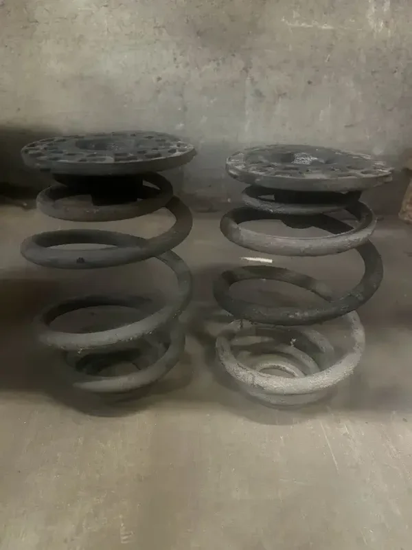 Opel Kadett E - Achteras veren + rubber's