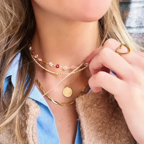 Fijn kettinkje met ronde fantasie bedel